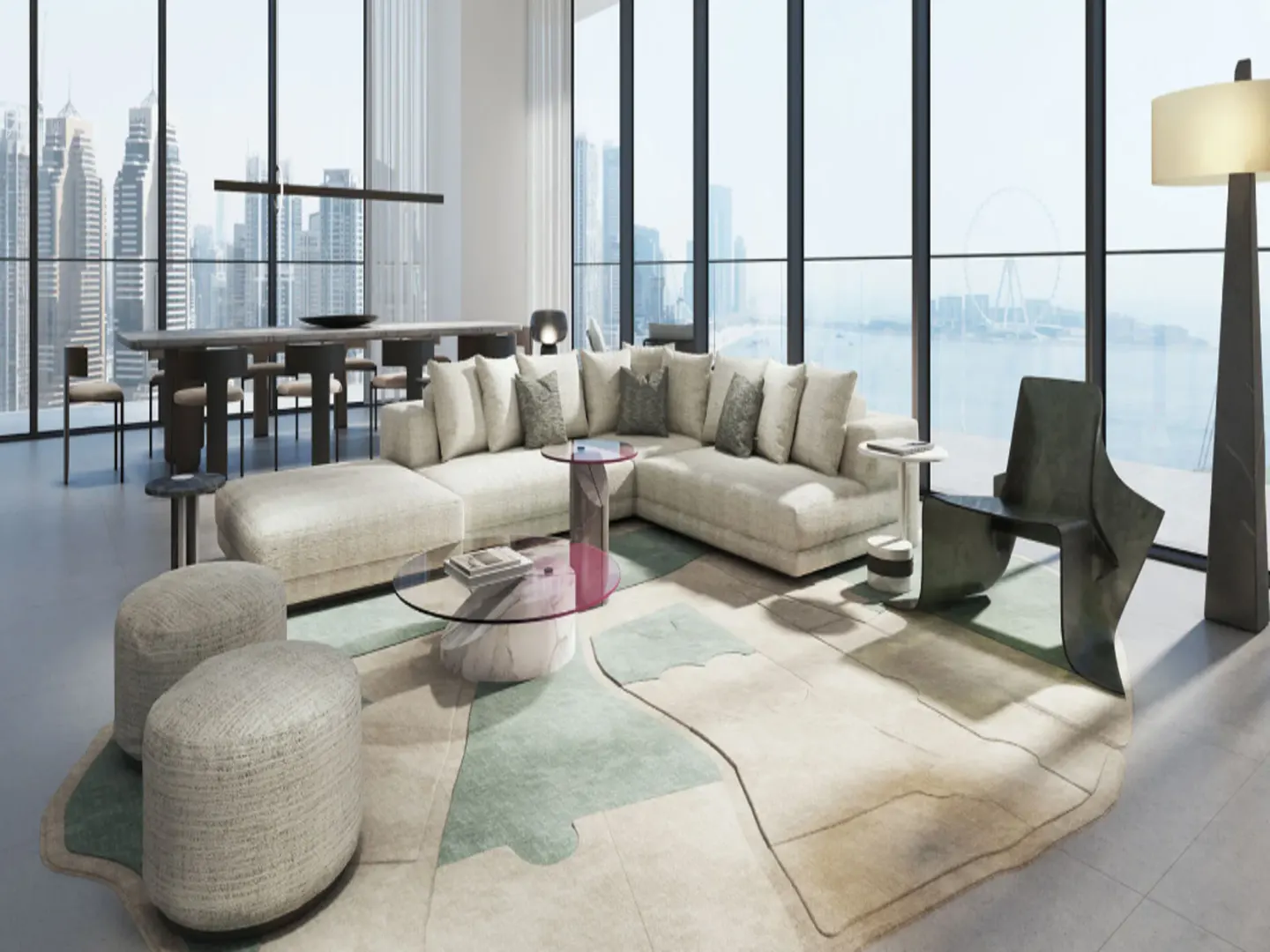 Bright, modern living room with a large white sectional sofa, patterned rug, and floor-to-ceiling windows with a city view.