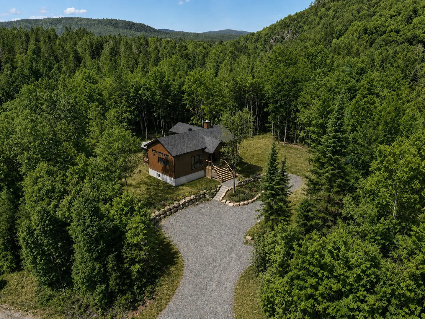 Aerial view of a brown house with a dark roof nestled in a lush green forest with a gravel driveway leading to the home.