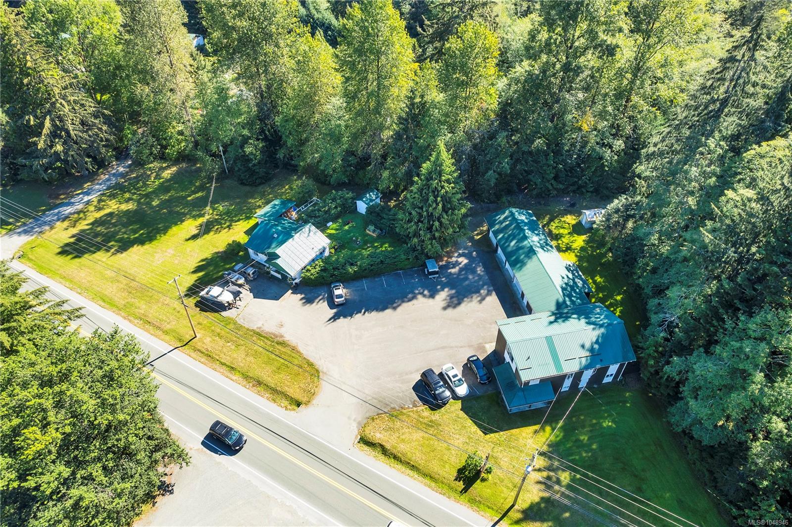 Legal triplex plus rancher over an acre in Sayward Valley