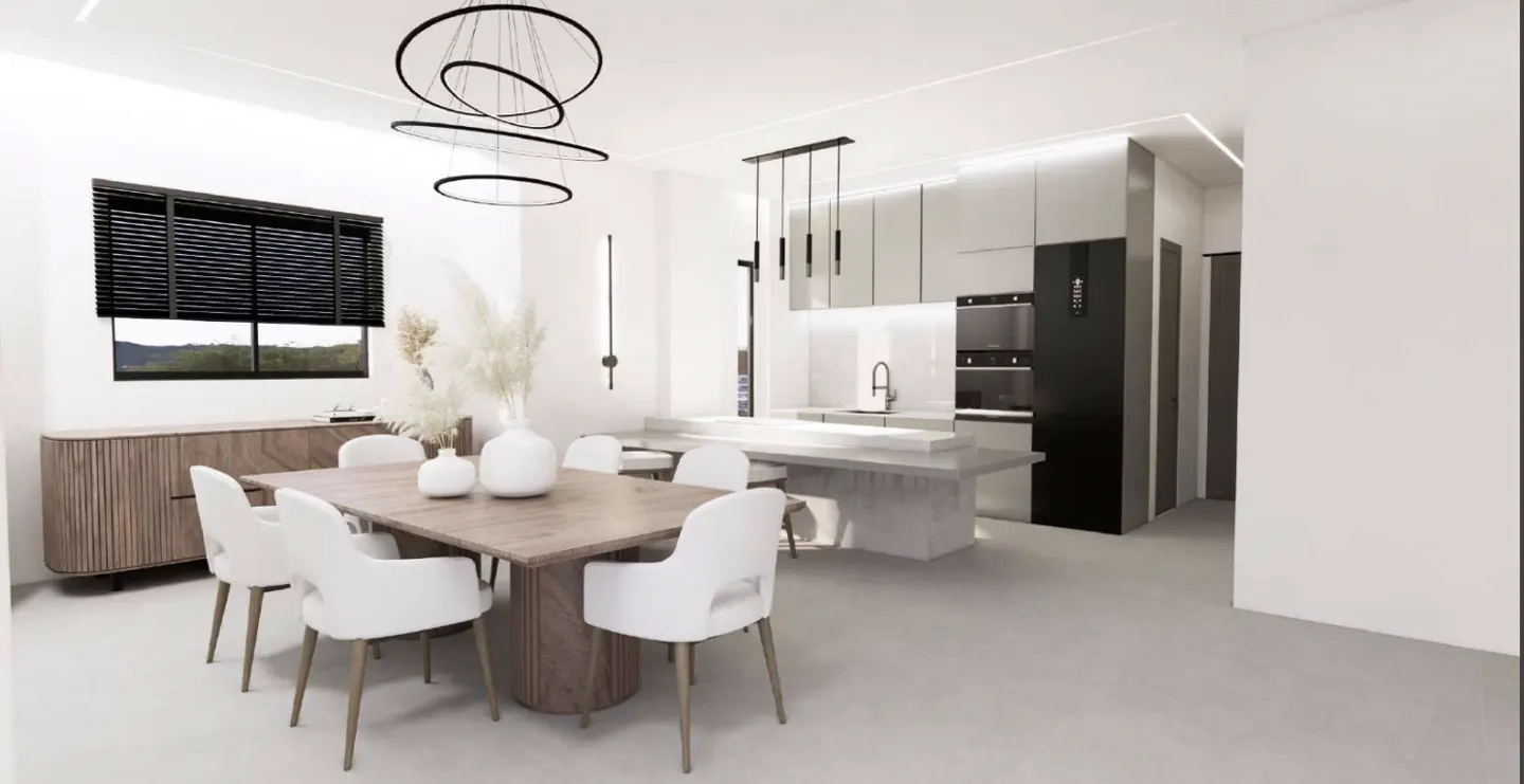 A modern, bright kitchen and dining area with white walls, wood table, and black accents.