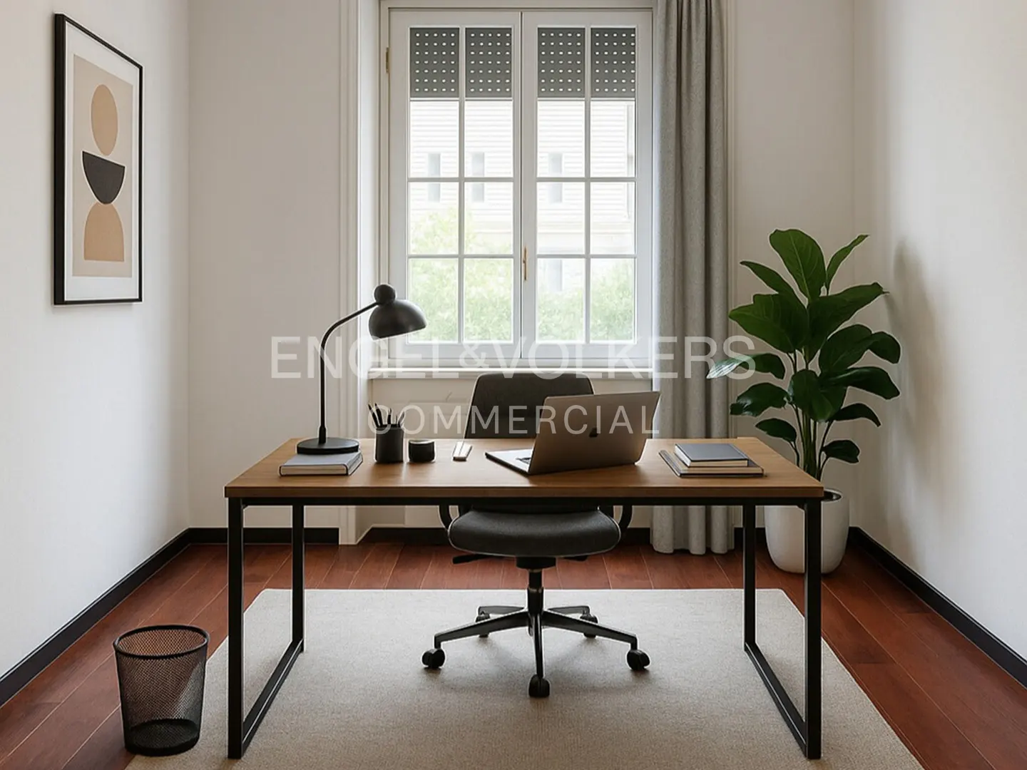 A bright home office with a wooden desk, black lamp, laptop, and a large window. A plant adds a touch of nature.