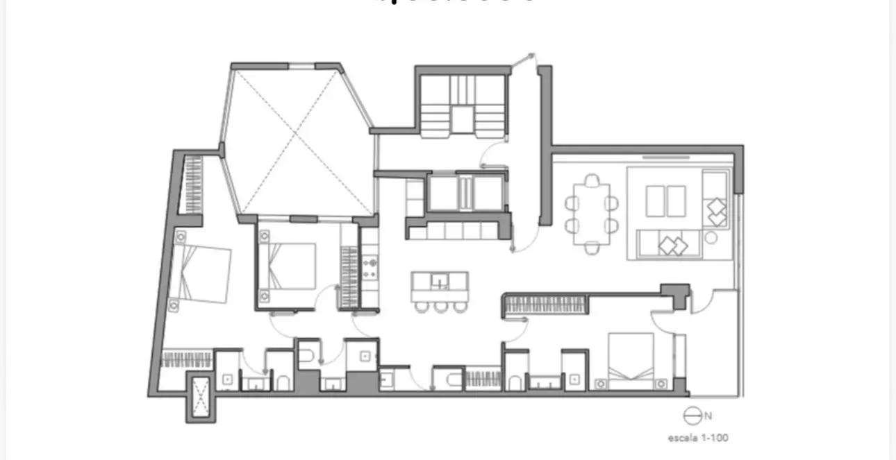 Architectural floor plan in gray and white, featuring two bedrooms, kitchen, living and dining area, and bathrooms.