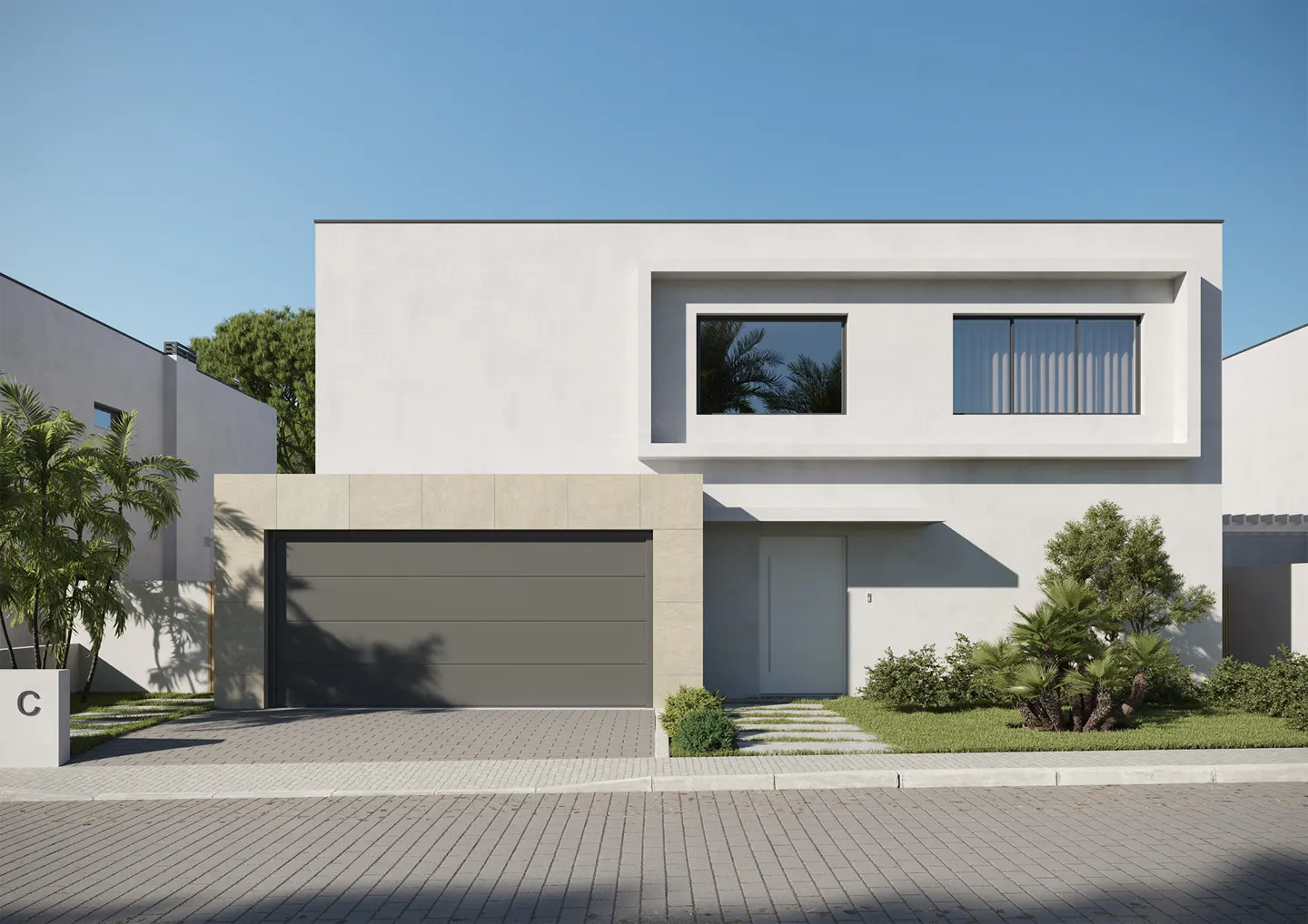 Modern two-story white house with a gray garage door and a white front door. Palm trees and green bushes surround the house. Blue sky.