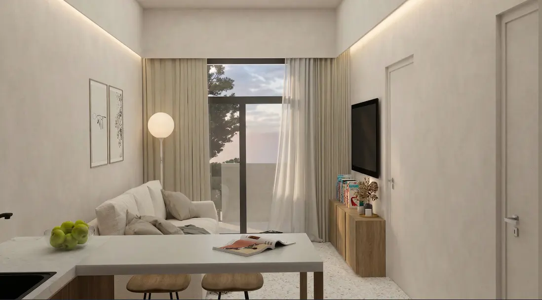Living room interior with white walls, sofa, TV, and a table with a magazine and stools. Curtains frame a window with a view.