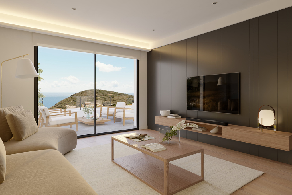 Modern living room with beige sofa, wooden coffee table, wall-mounted TV, and sliding doors opening to a scenic sea view.