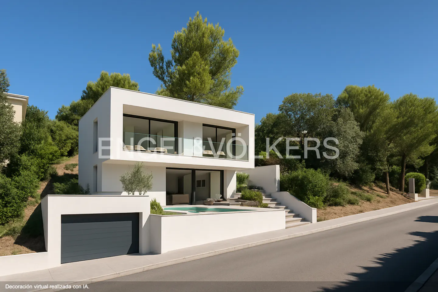 Two-story modern white house with a gray garage door, pool, and balcony on a sunny day. Trees in the background.