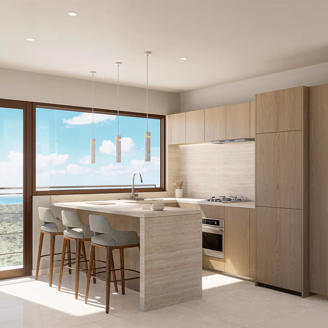 A modern kitchen with a marble island, three stools, and a large window with an ocean view.
