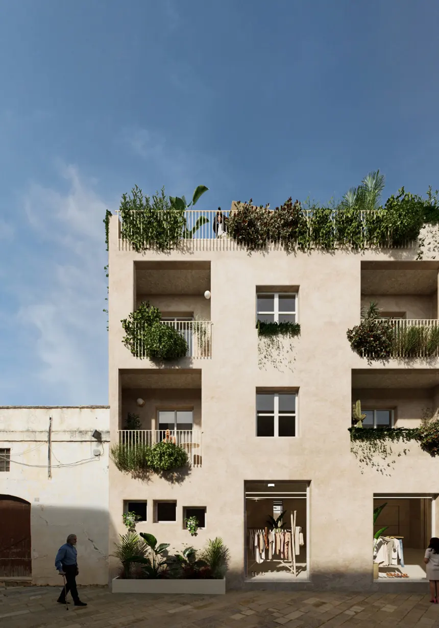 Beige apartment building with balconies and rooftop garden. Clothing store on the ground floor. Blue sky.