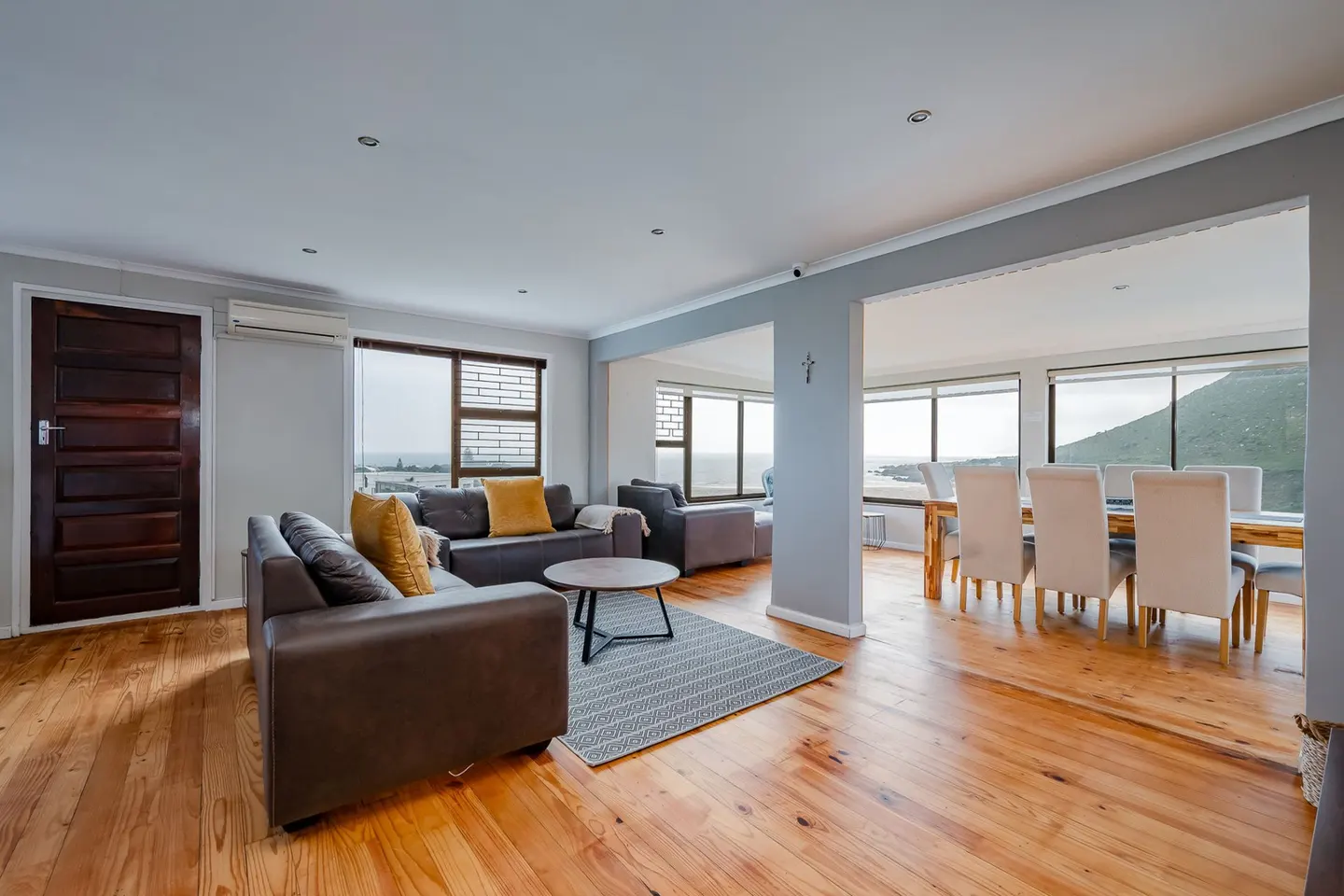 Upstairs:  Spacious livingand dining area offering panoramic views