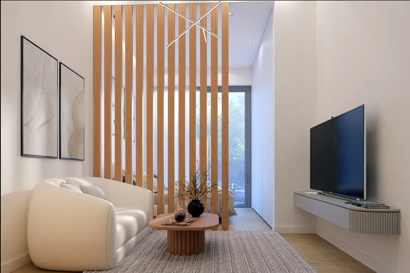 Living room with a white sofa, wood slat partition, and a TV on a floating shelf. A gray rug covers the floor.