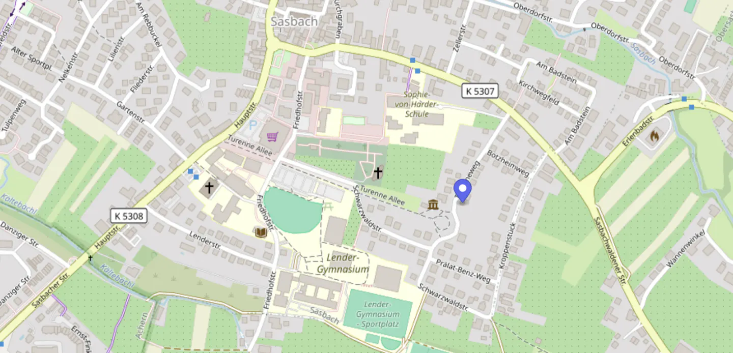 Map of Sasbach, Germany, showing streets, schools, and a blue pin marking a location near the Pralat-Benz-Weg.