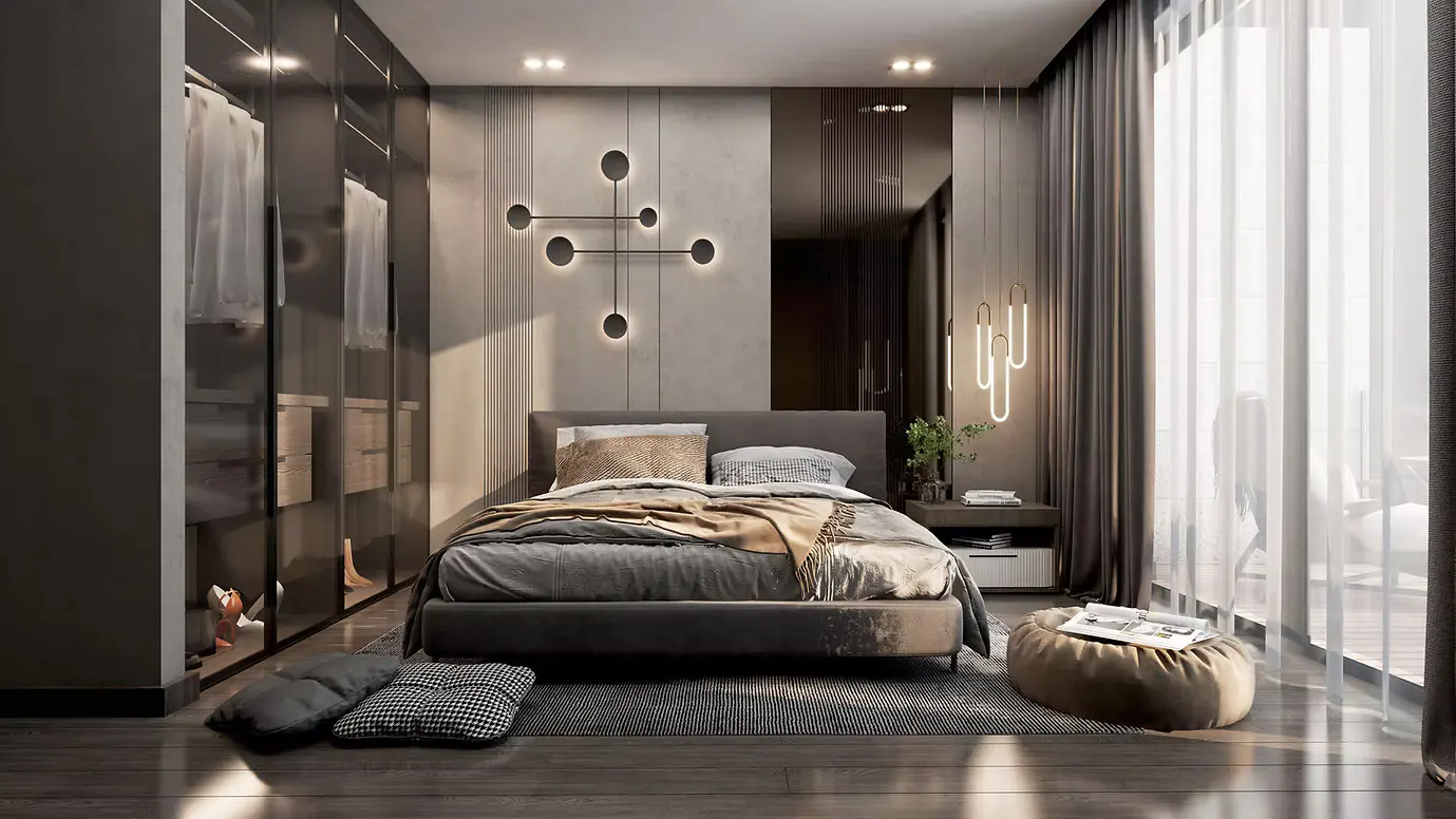 Modern bedroom with a gray bed, a walk-in closet, and a large window with sheer white curtains. A unique light fixture is on the wall.