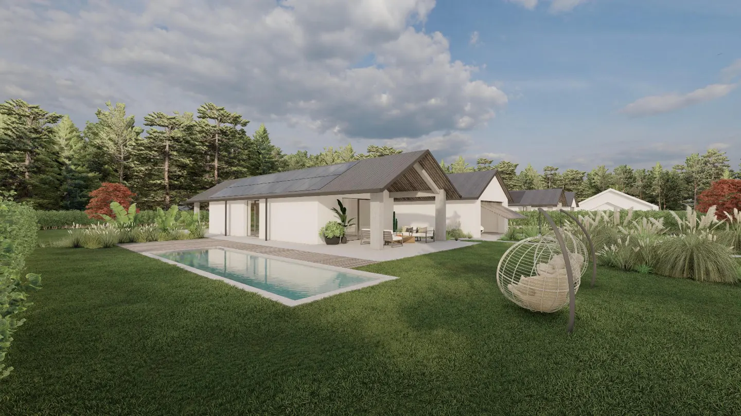 Modern white house with a dark roof, swimming pool, patio furniture, and hanging egg chair in a lush, wooded backyard.