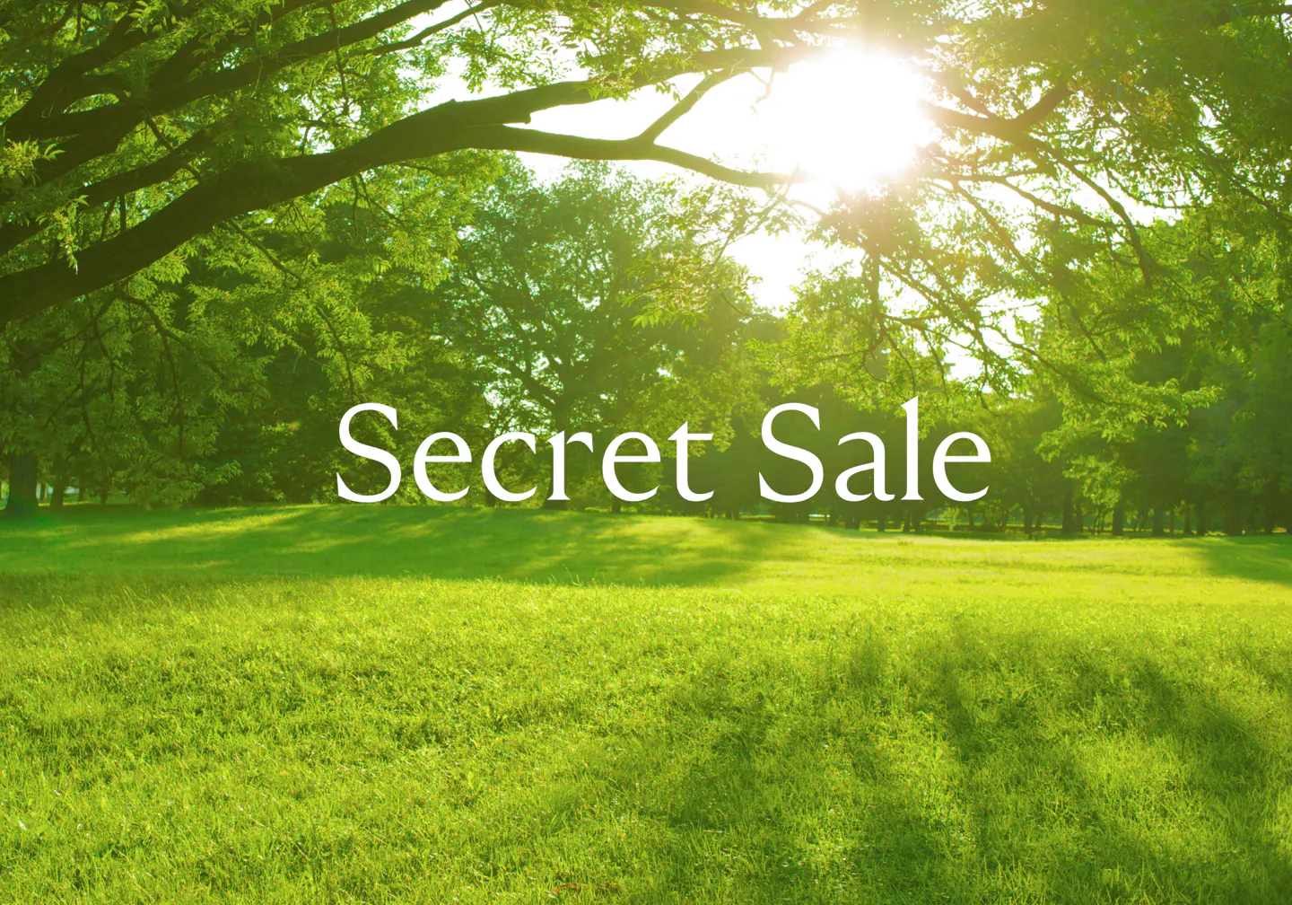 Green lawn with trees and sunlight. White text overlay reads "Secret Sale".