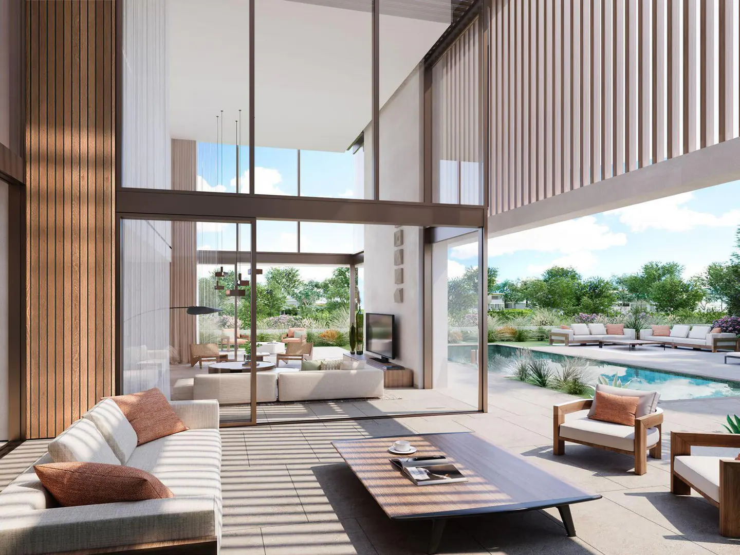 Bright, modern living room with floor-to-ceiling windows overlooking a pool and patio with outdoor seating.
