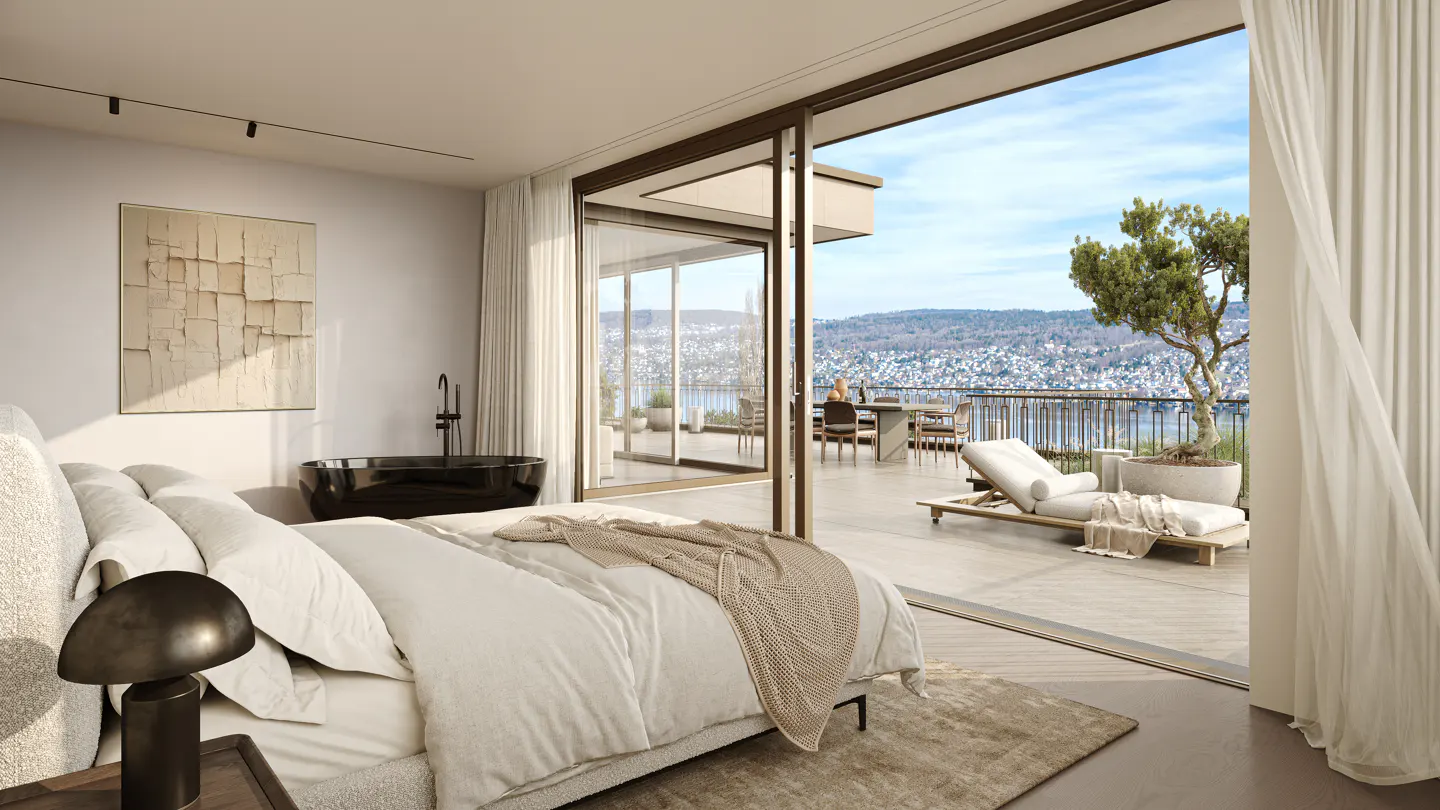 Bedroom with a large sliding glass door to a balcony with a lounge chair and a view of a city.