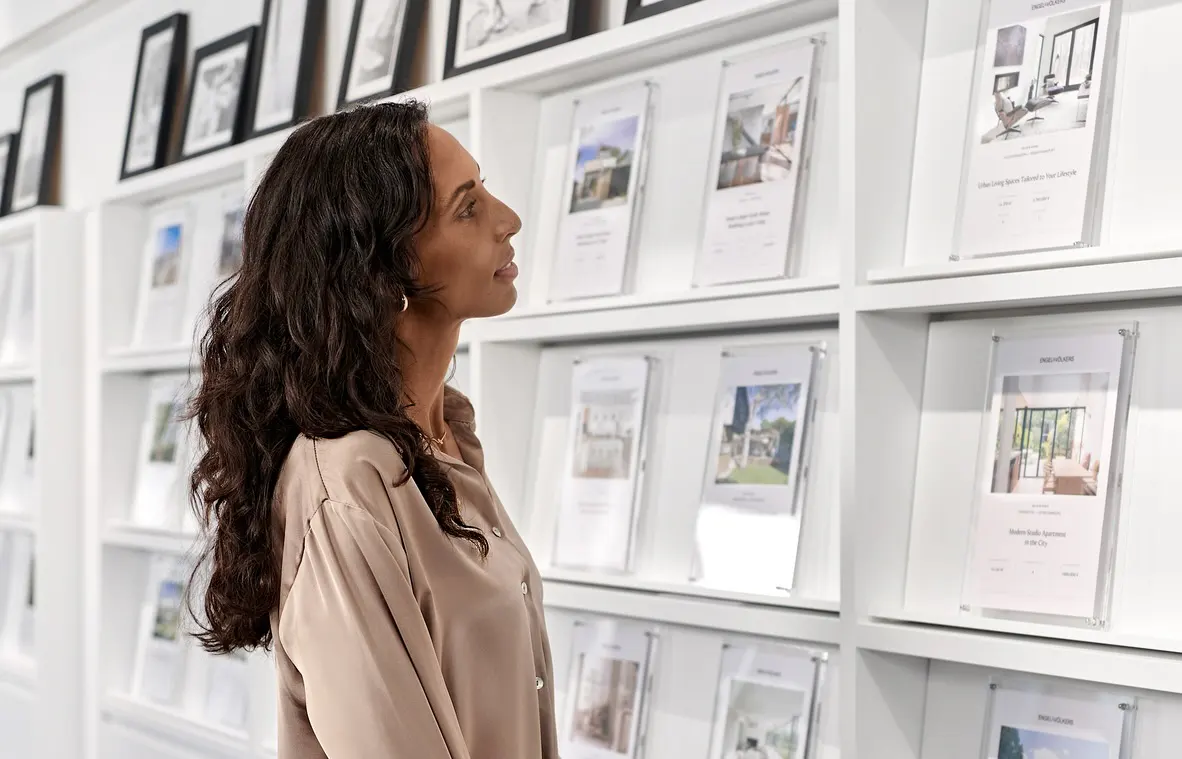 Client browsing property listings in an office