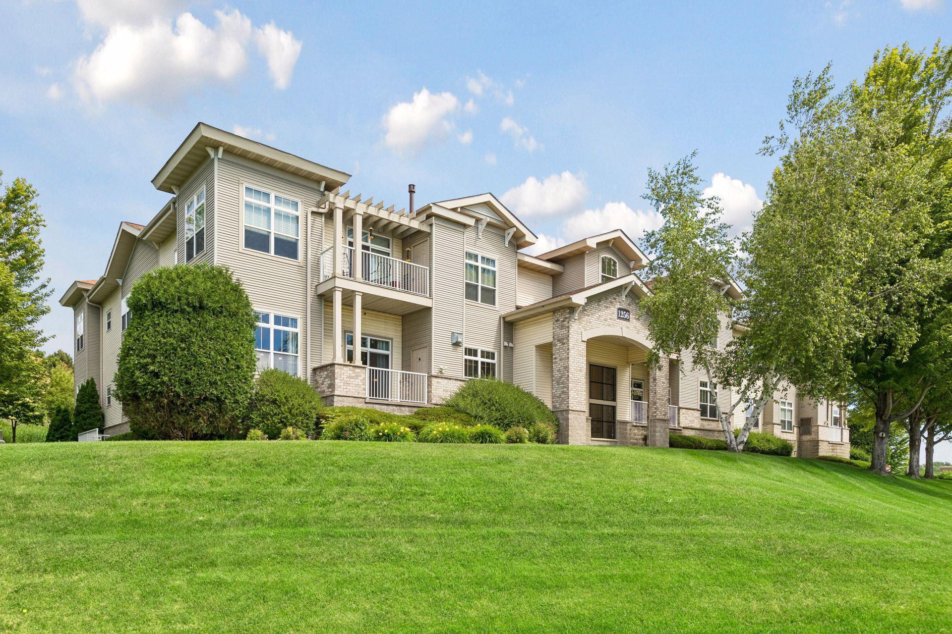 Refined End-Unit Condo: 10' Ceilings & Private Porch