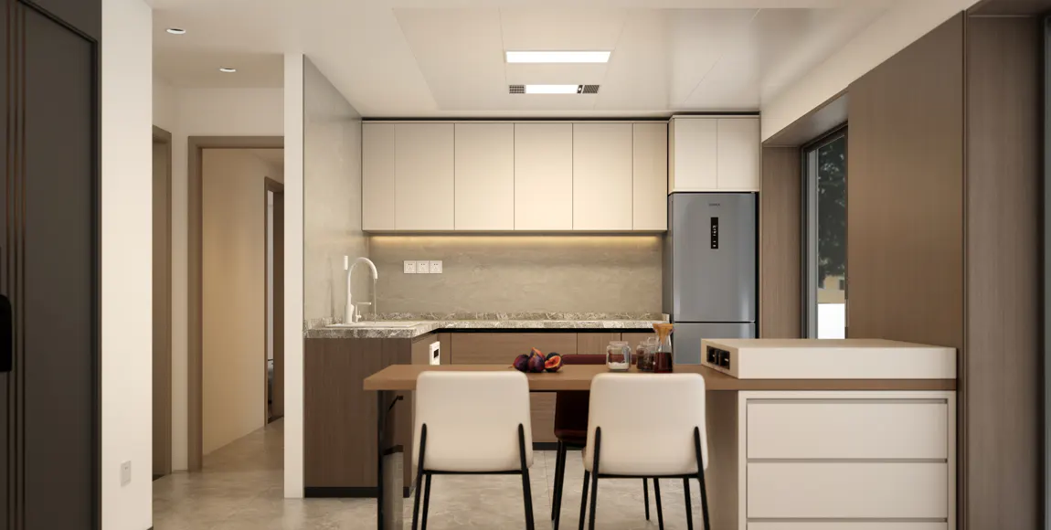 A modern kitchen with white cabinets, a gray refrigerator, and a wooden table with white chairs. A window is visible on the right.