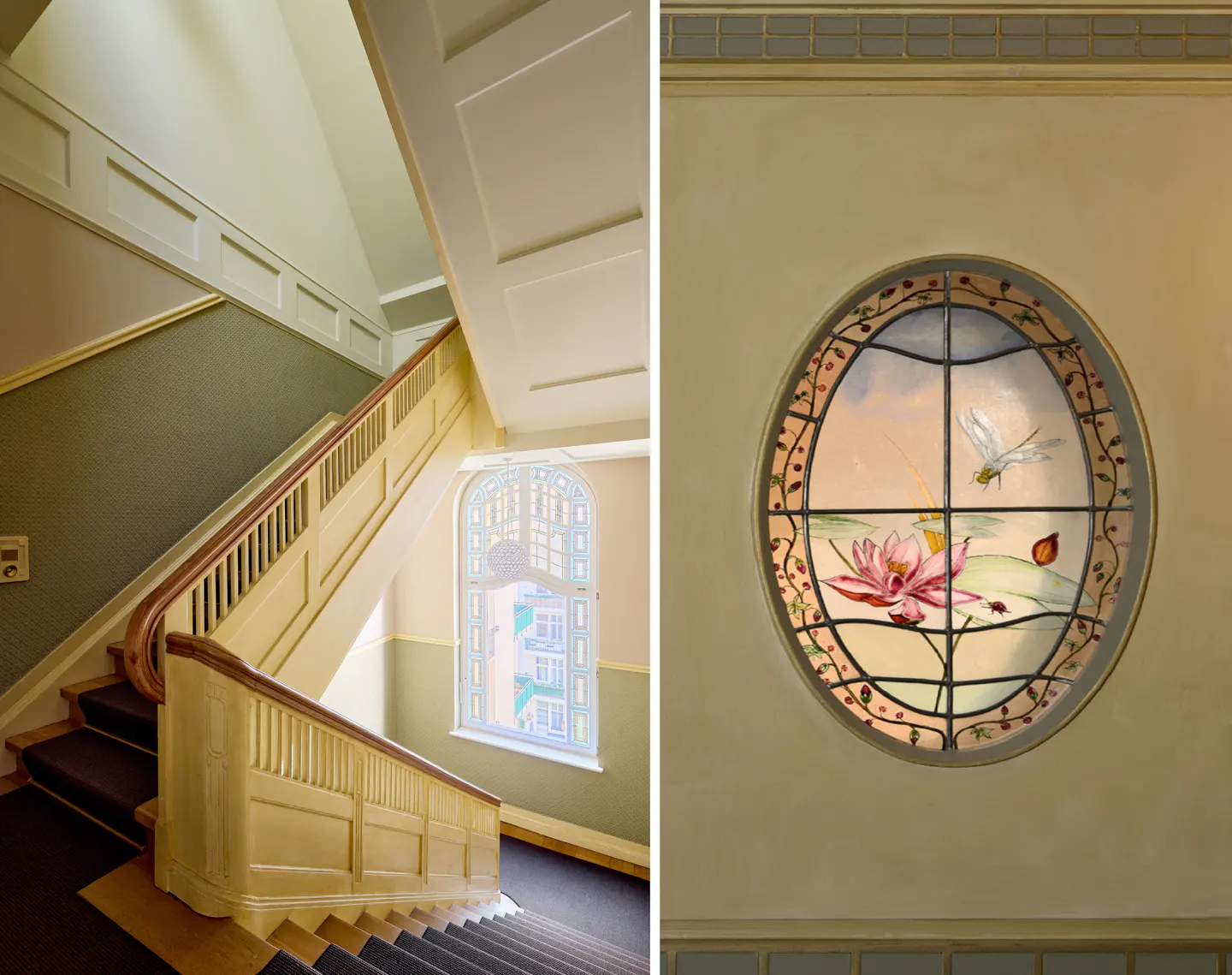 Interior view of a staircase with a stained glass window. The window has a lotus flower and dragonfly design.