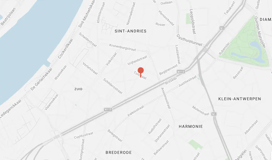 Map view of Sint-Andries, Antwerp, Belgium, with a red pin marking Tolstraat. Streets and neighborhoods are labeled in black text.