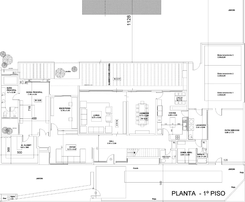 Black and white architectural floor plan of a house, labeled "PLANTA - 1° PISO," showing room layouts, dimensions, and outdoor spaces.