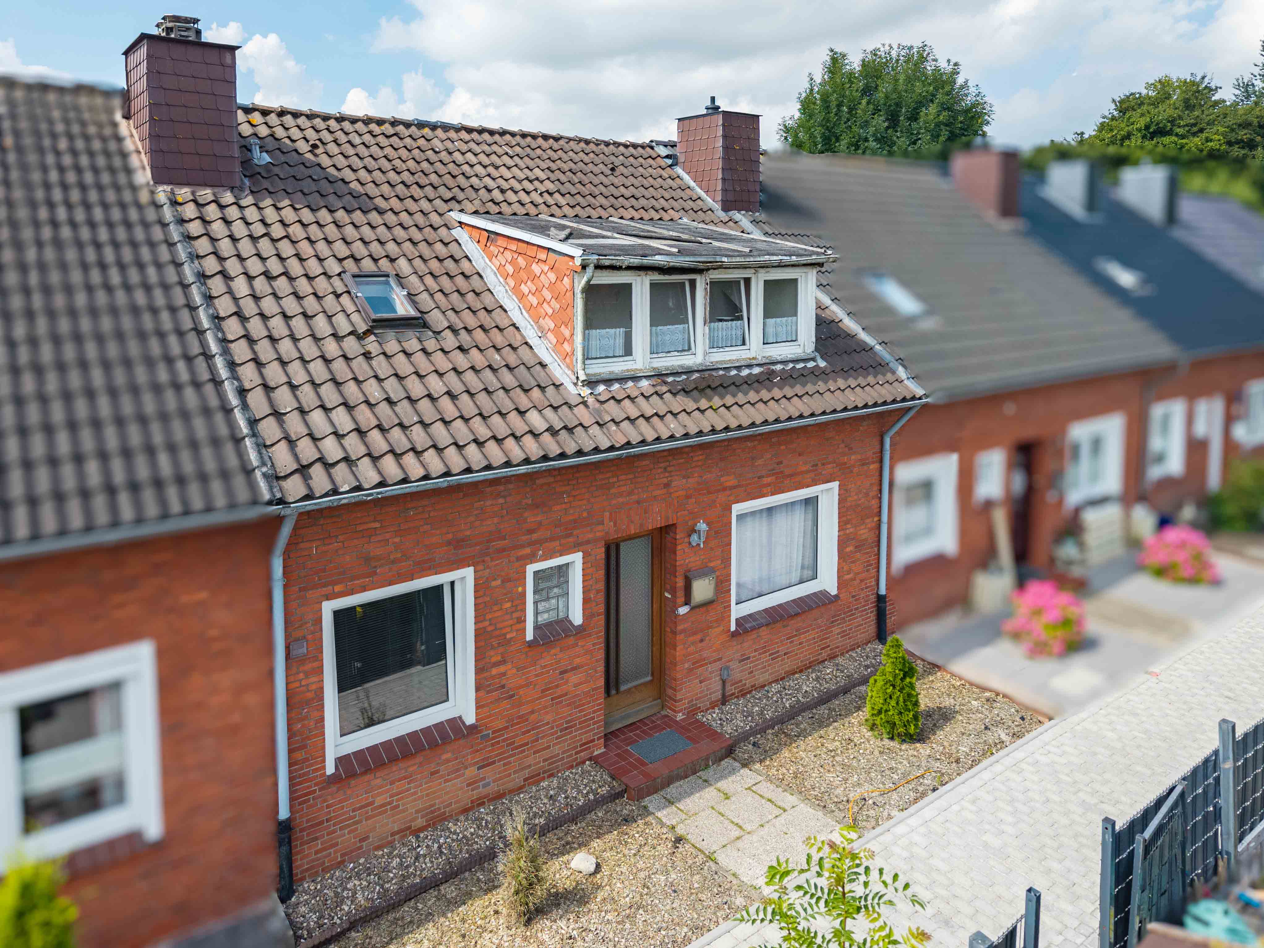 Kapitalanlage mit Potenzial – Vermietetes Reihenmittelhaus mit Garage
