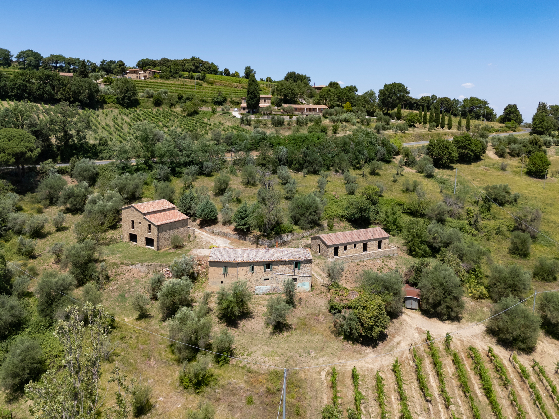 Drei Landhäuser im Herzen des Brunello di Montalcino