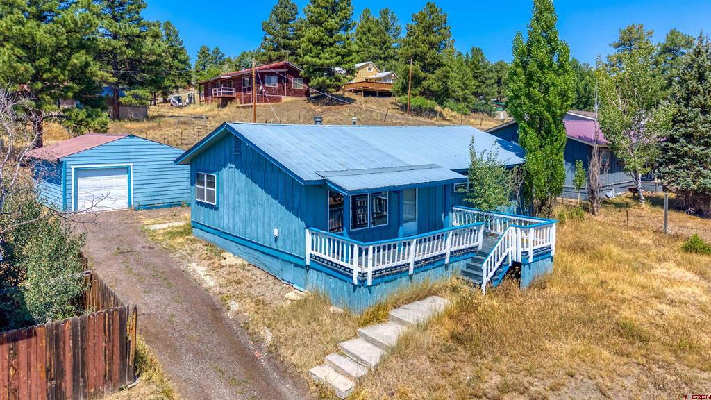 BIG VIEWS + IN-TOWN LOCATION + TONS OF POTENTIAL!
