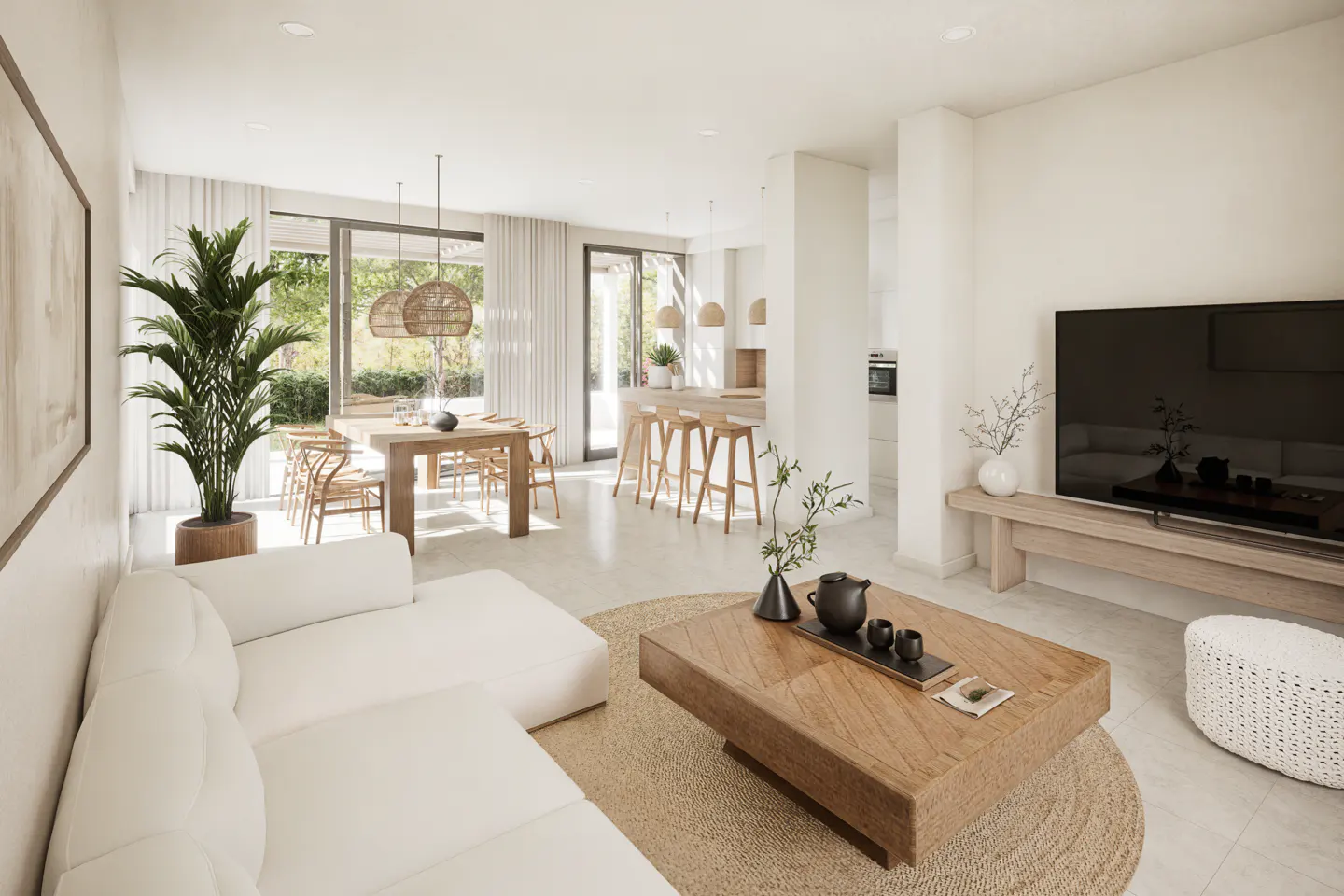 Bright, open-plan living space with white sofa, wood coffee table, and TV. Dining area and kitchen visible in the background.