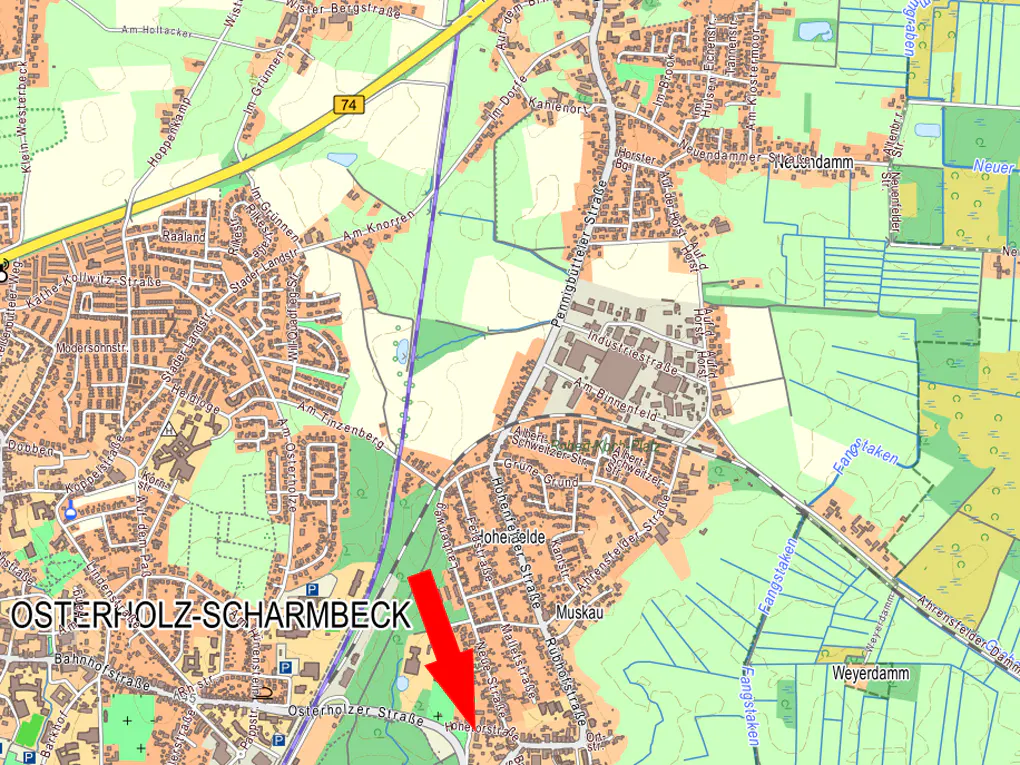 Map of Osterholz-Scharmbeck, Germany, with streets, green spaces, and a red arrow pointing to a specific location.