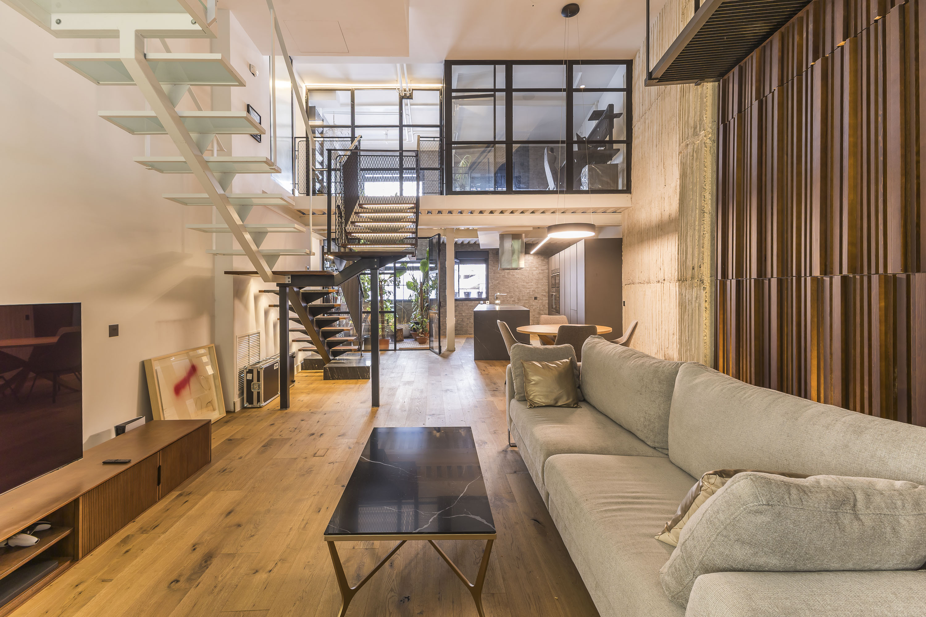 Unique one-of-a-kind duplex with an indoor oasis in Acacias.