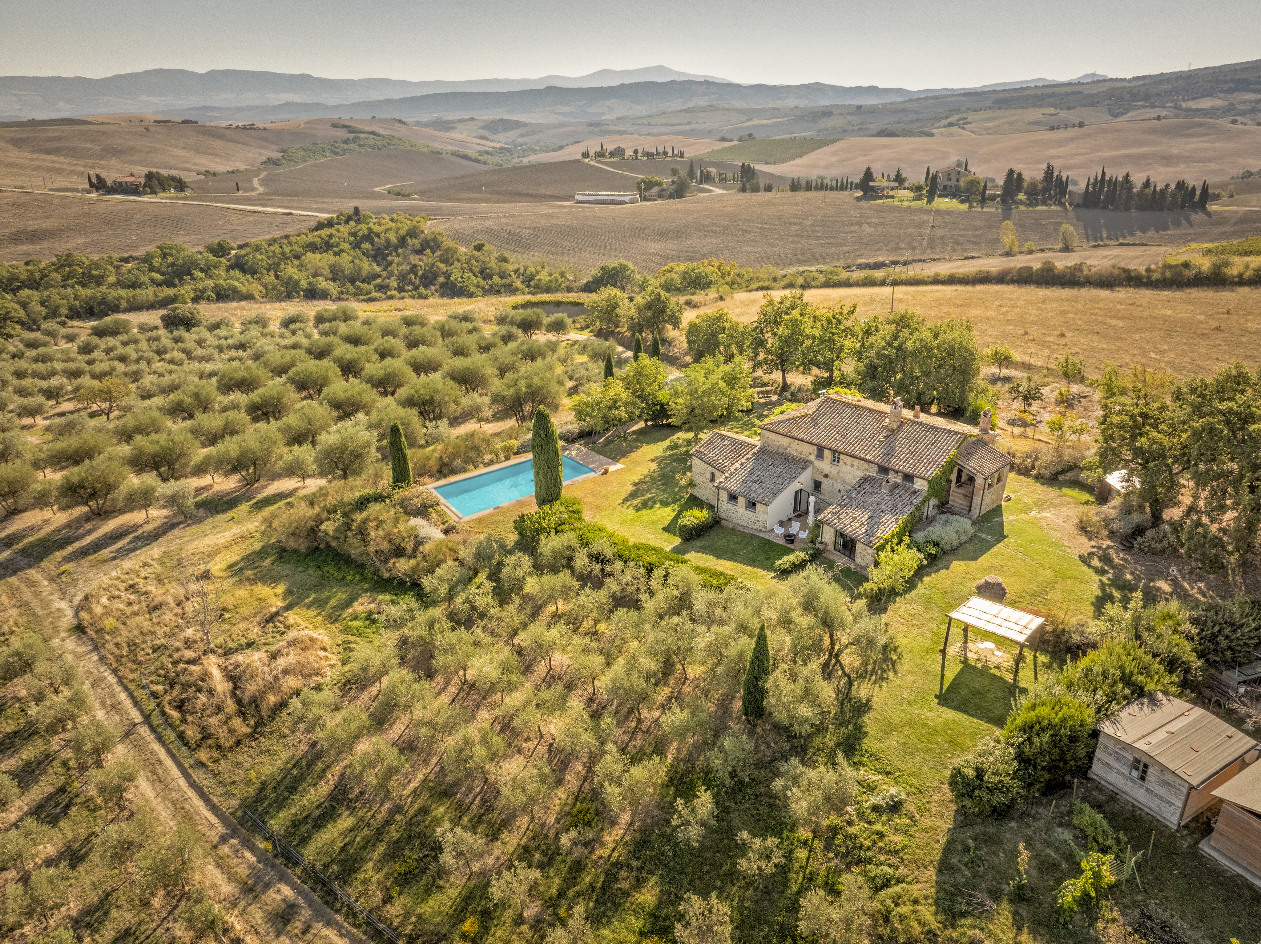 Farmhouse in a magical setting with land