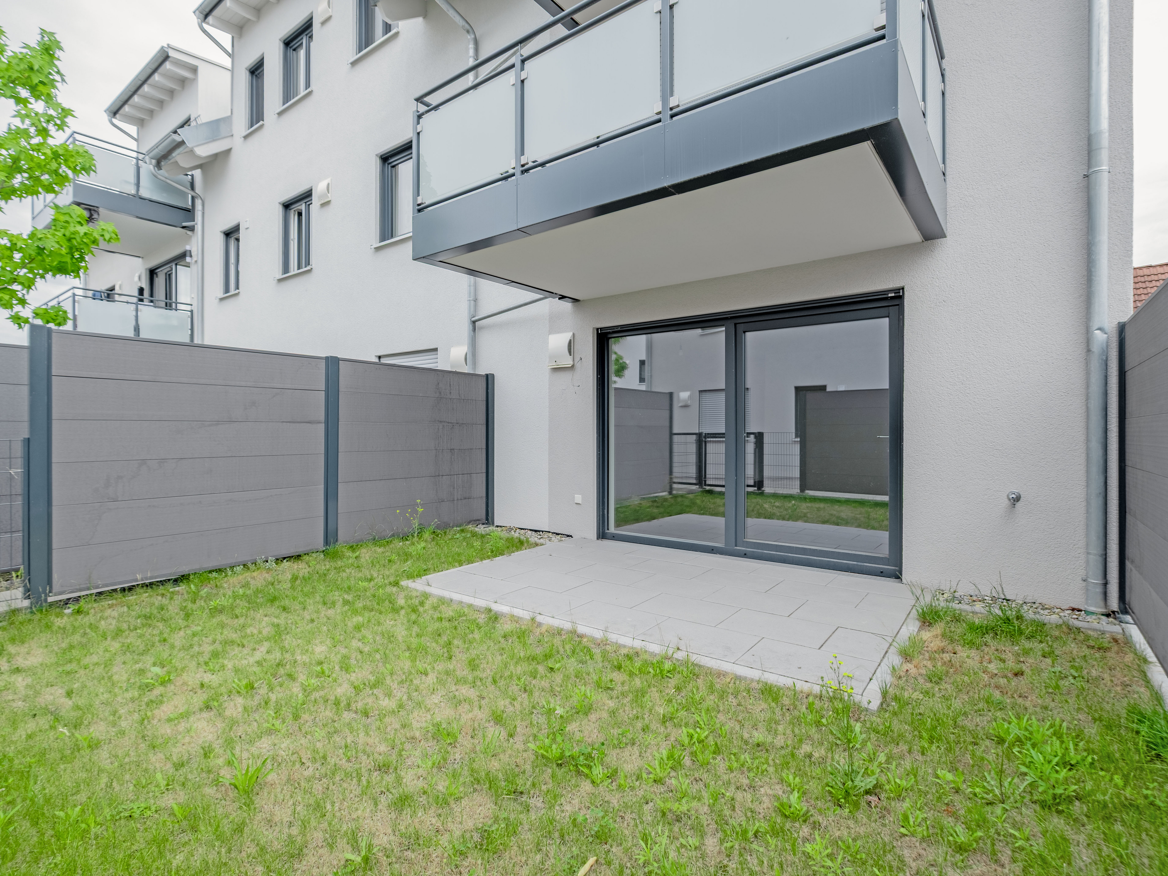 Vermietete Erdgeschosswohnung mit Terrasse und privatem Gartenanteil