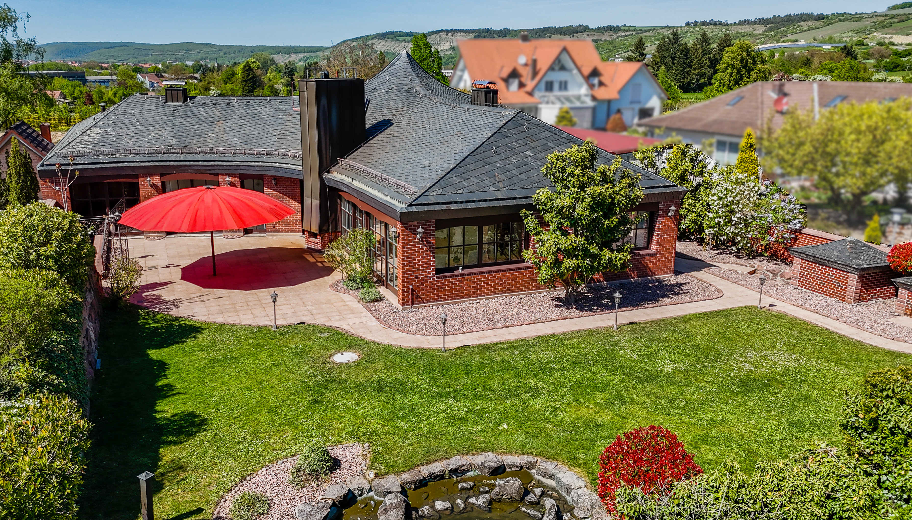 Wo Wohnen zur Lebenskunst wird: Exklusive Villa mit Spa-Oase und Traumgarten