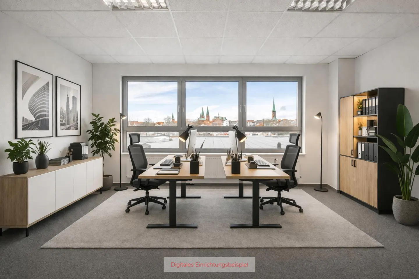 Bright office space with two desks, black chairs, and a large window overlooking a city with church spires.