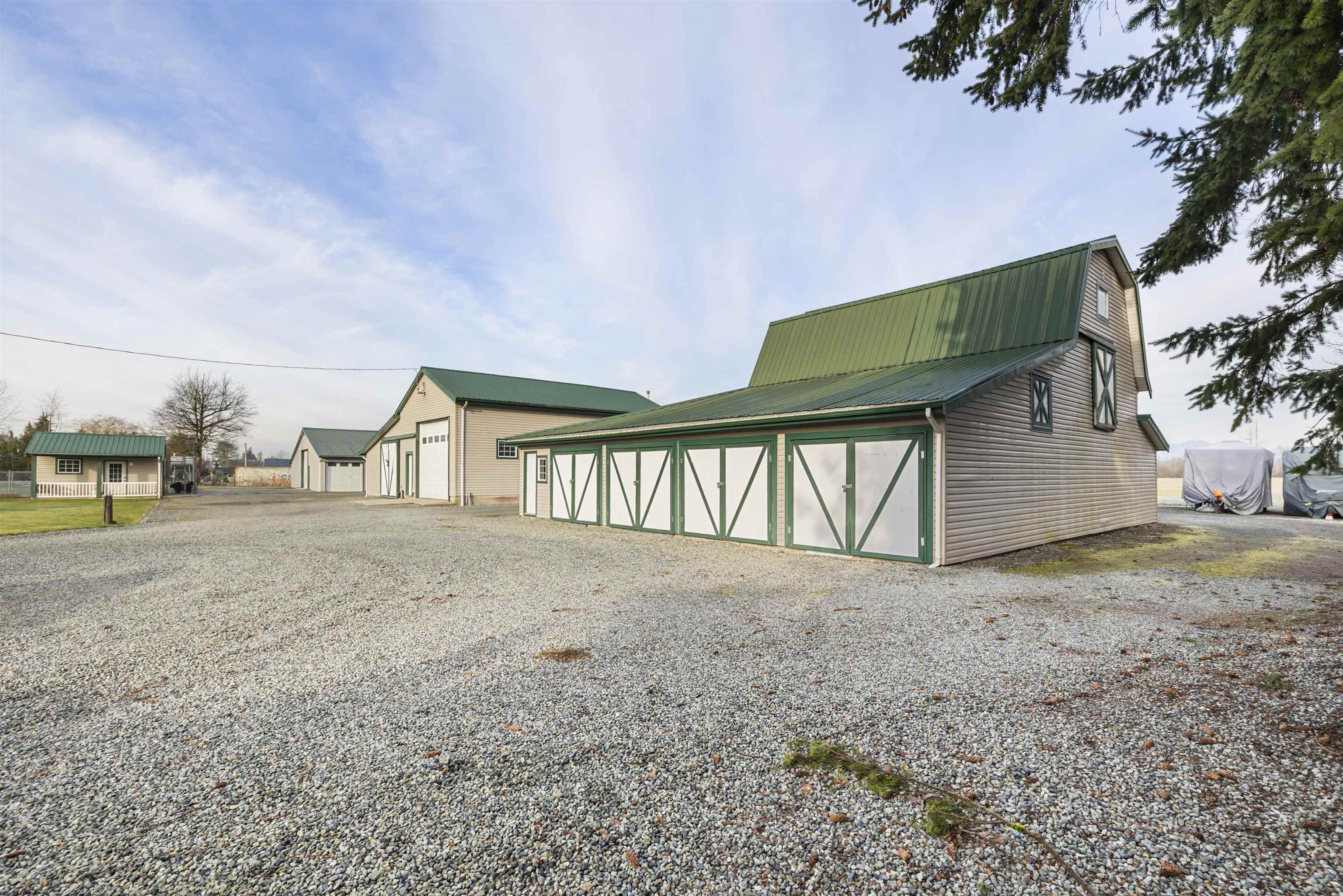 Income-Producing Langley Farm with Pasture, Shops & Cottage