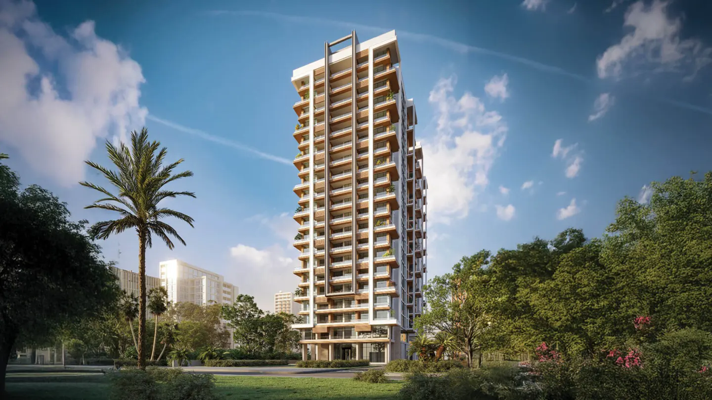 Modern high-rise apartment building with balconies, set against a blue sky with trees and a palm tree in the foreground.