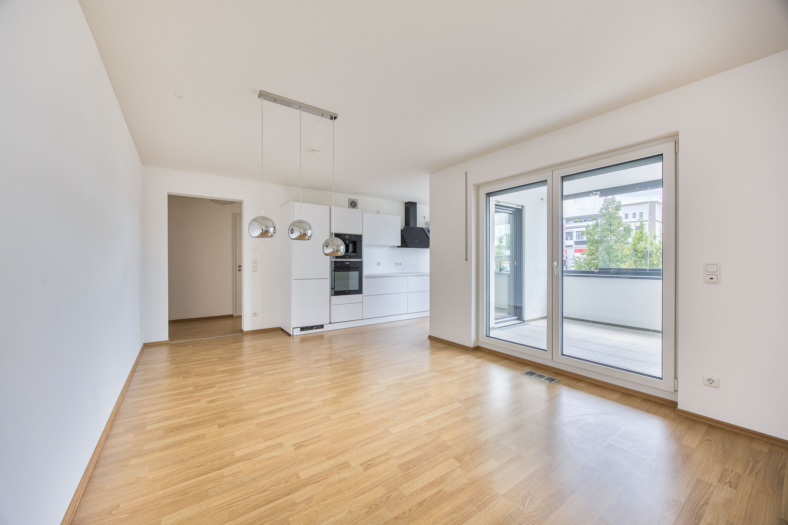 Moderne 3-Zimmer-Eigentumswohnung mit Wintergartencharakter, hochwertiger Ausstattung und Tiefgaragenstellplatz